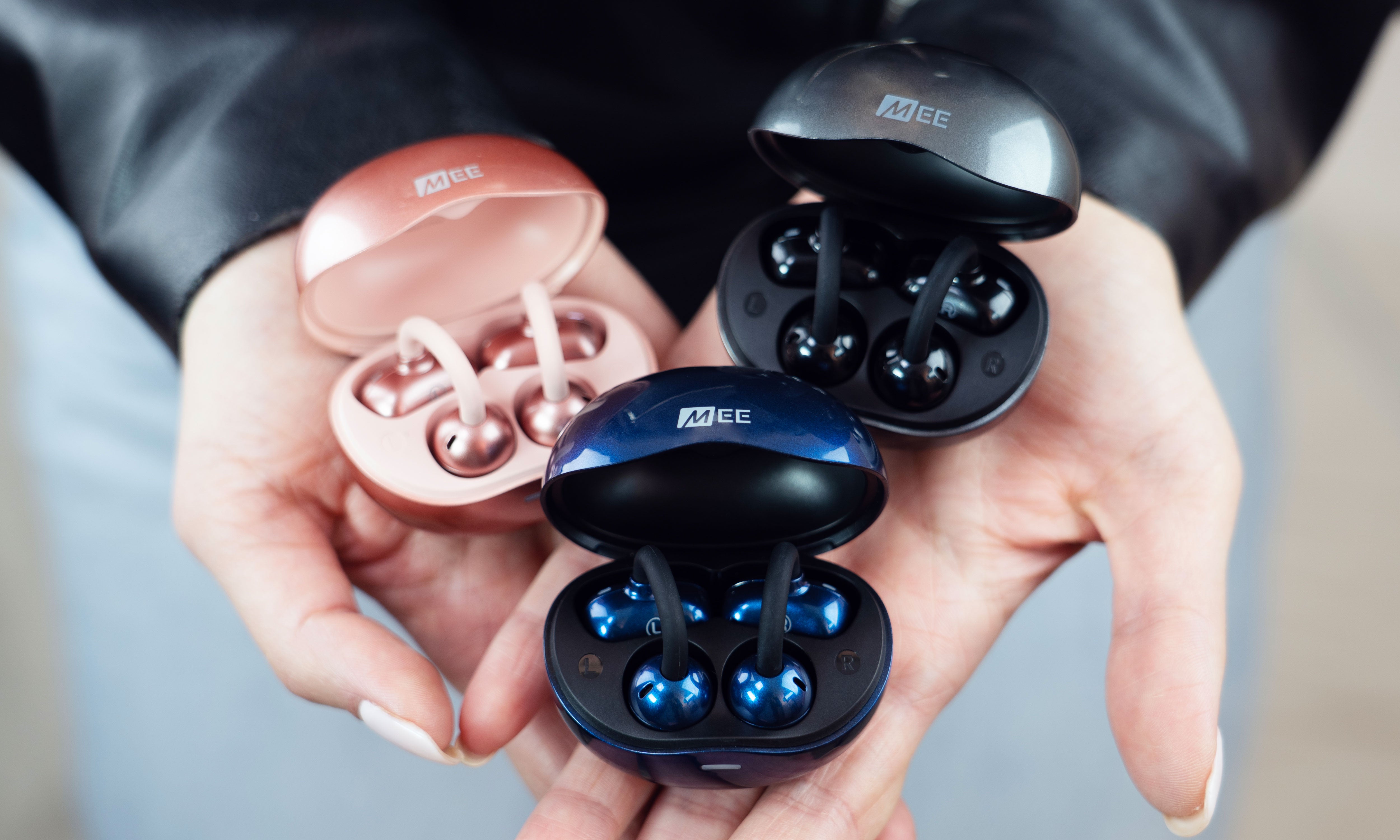 Pebbles Air open ear earbuds worn during daily activity
